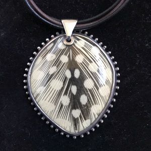 Silpada feather, resin, and leather necklace